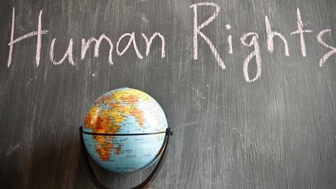 human rights written on a board