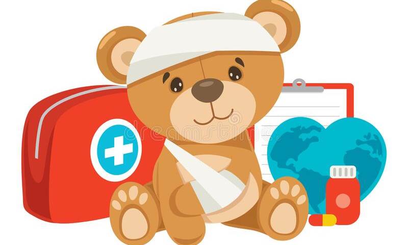 Cartoon teddy with a bandage on his head sitting beside a doctor's suitcase, a clipboard and a medicine bottle.
