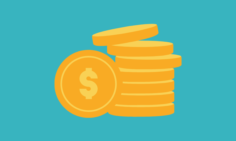 STACK OF COINS AGAINST A BLUE BACKGROUND