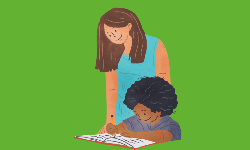 Person helping a child read a book 