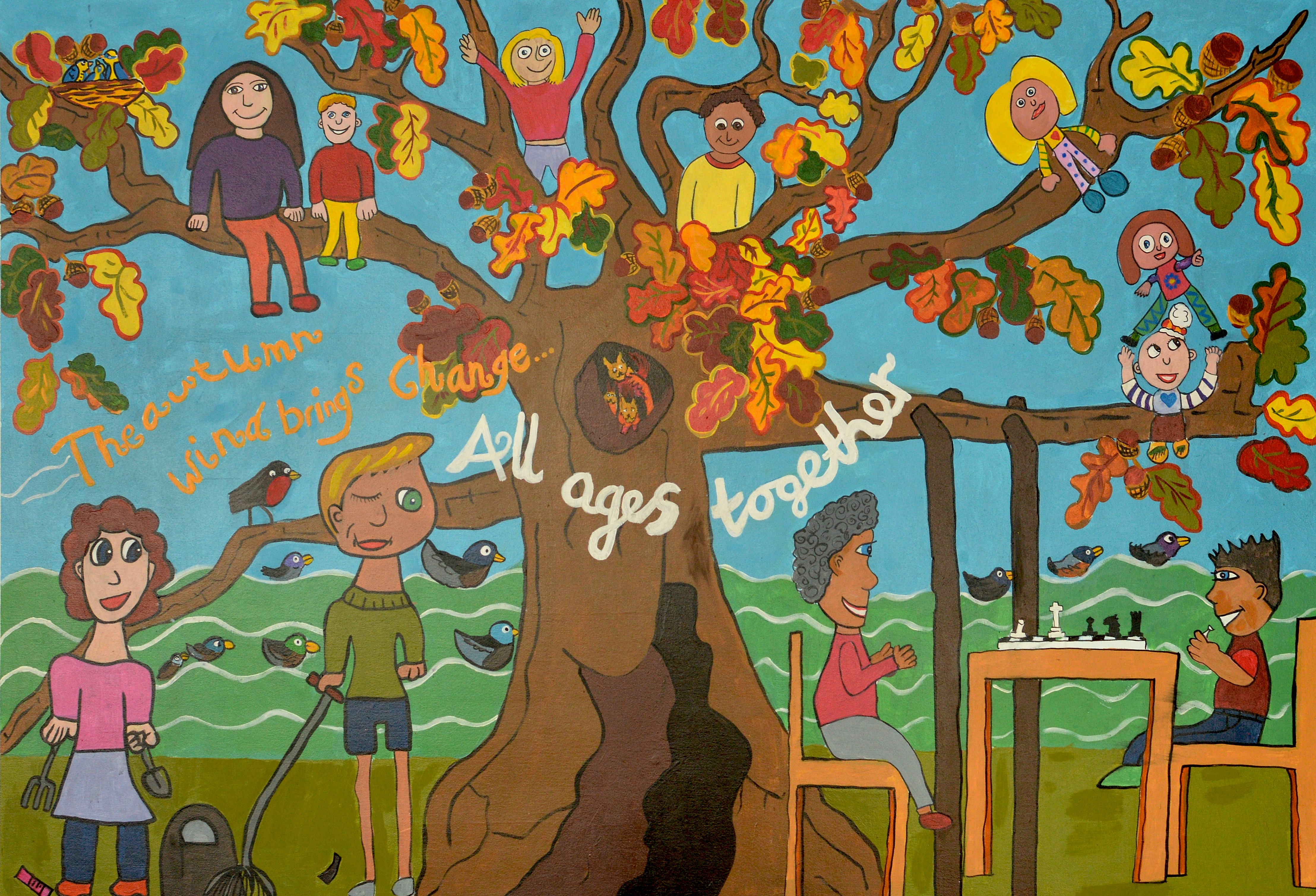 Painted mural of a tree with children climbing the branches and an adult and child playing chess underneath. The words "All ages together" are painted in white across the tree trunk.