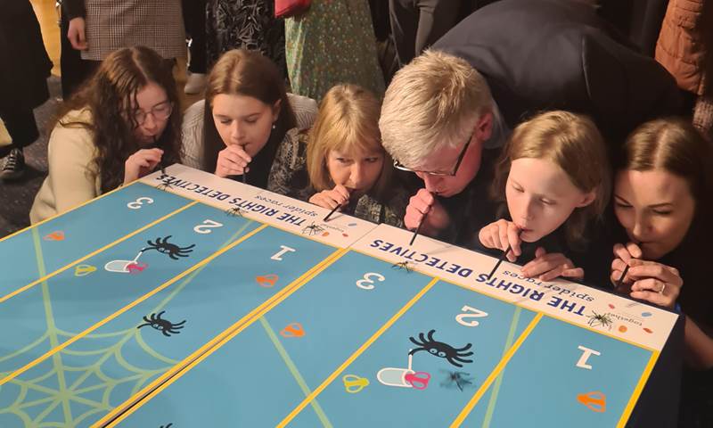 photo of children, young people and adult supporters playing the spider race game at Together's parliamentary event