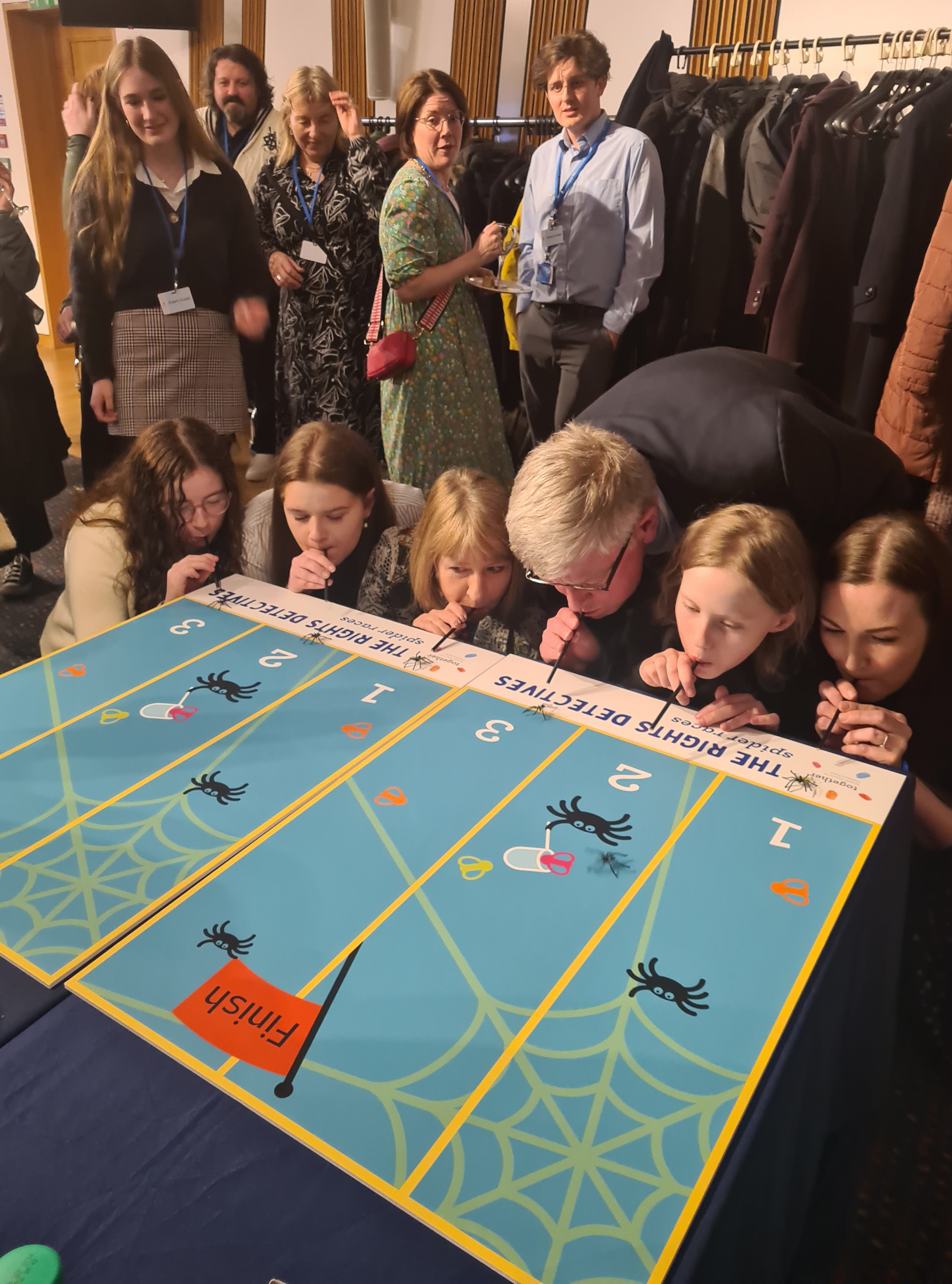 photo of children, young people and adult supporters playing the spider race game at Together's parliamentary event