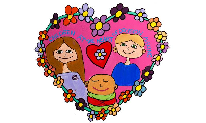 three children in a heart of flowers and a heart next to them.jpg
